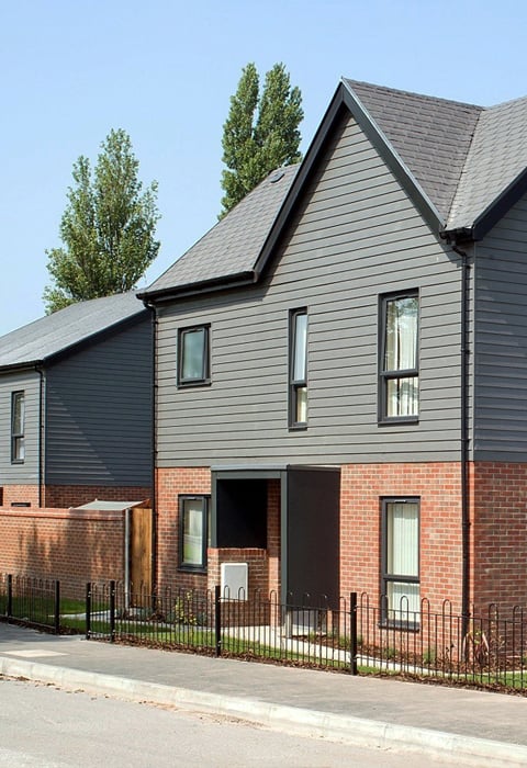 Modern two-story houses with Cedral fibre cement facades and pitched roofs, providing solutions for housebuilders