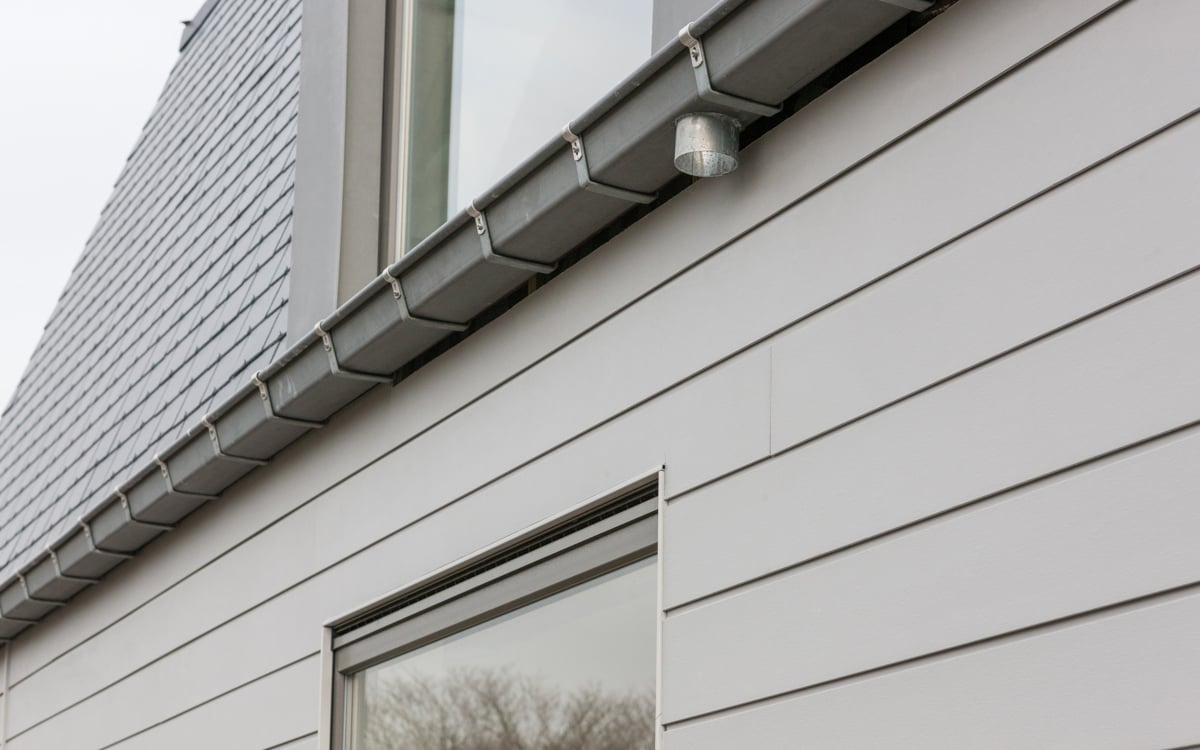 Exterior original con Siding Cedral