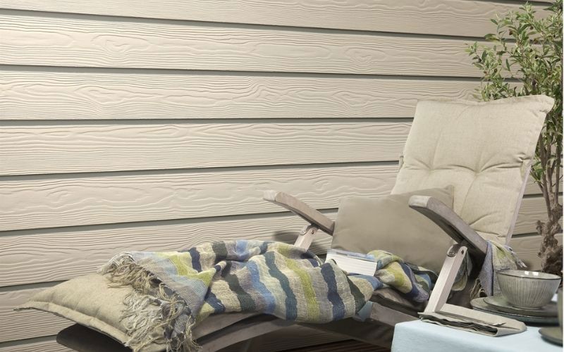 white weatherboards white armchair