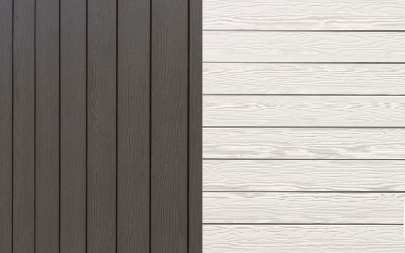 on the left dark brown weatherboard side on the right white weatherboard side