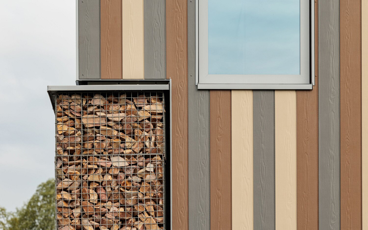 Markante kleurencombinatie van Cedral sidings geeft nieuw dierenasiel levendige look