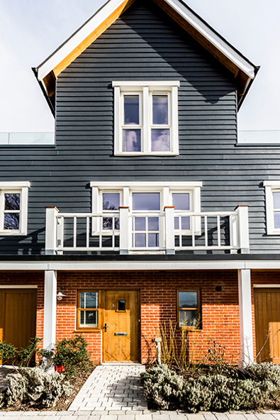 Black Cedral shiplap cladding with a wood effect finish 